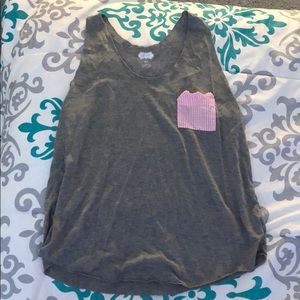grey tank with pink and white stripped pocket